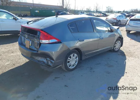 2011 Honda Insight from USA, damaged, VIN JHMZE2H31BS008200
